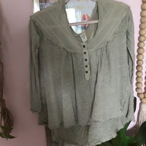 Mint green we the free top